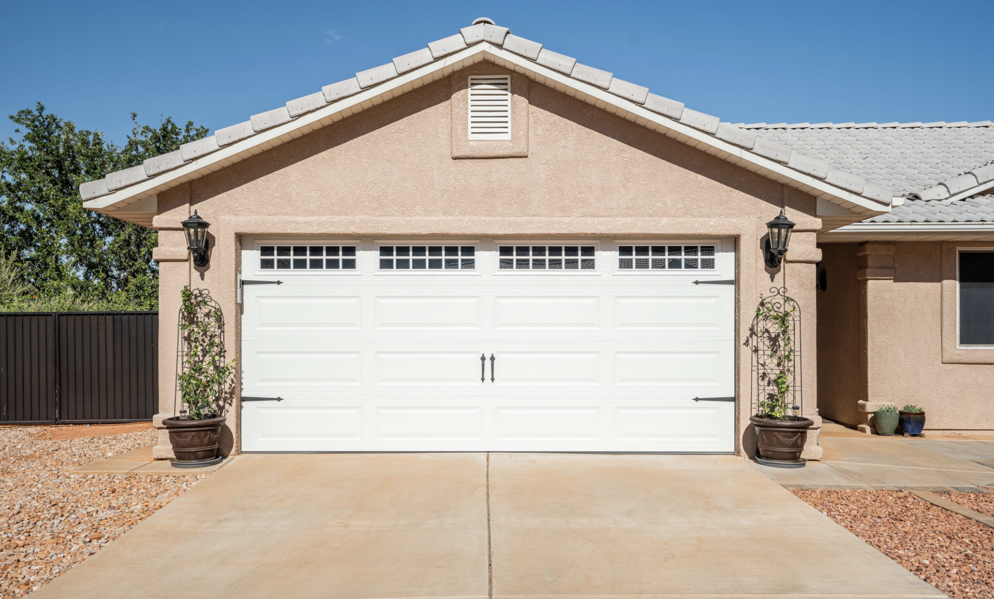 homeowners comparing Layton garage door openers