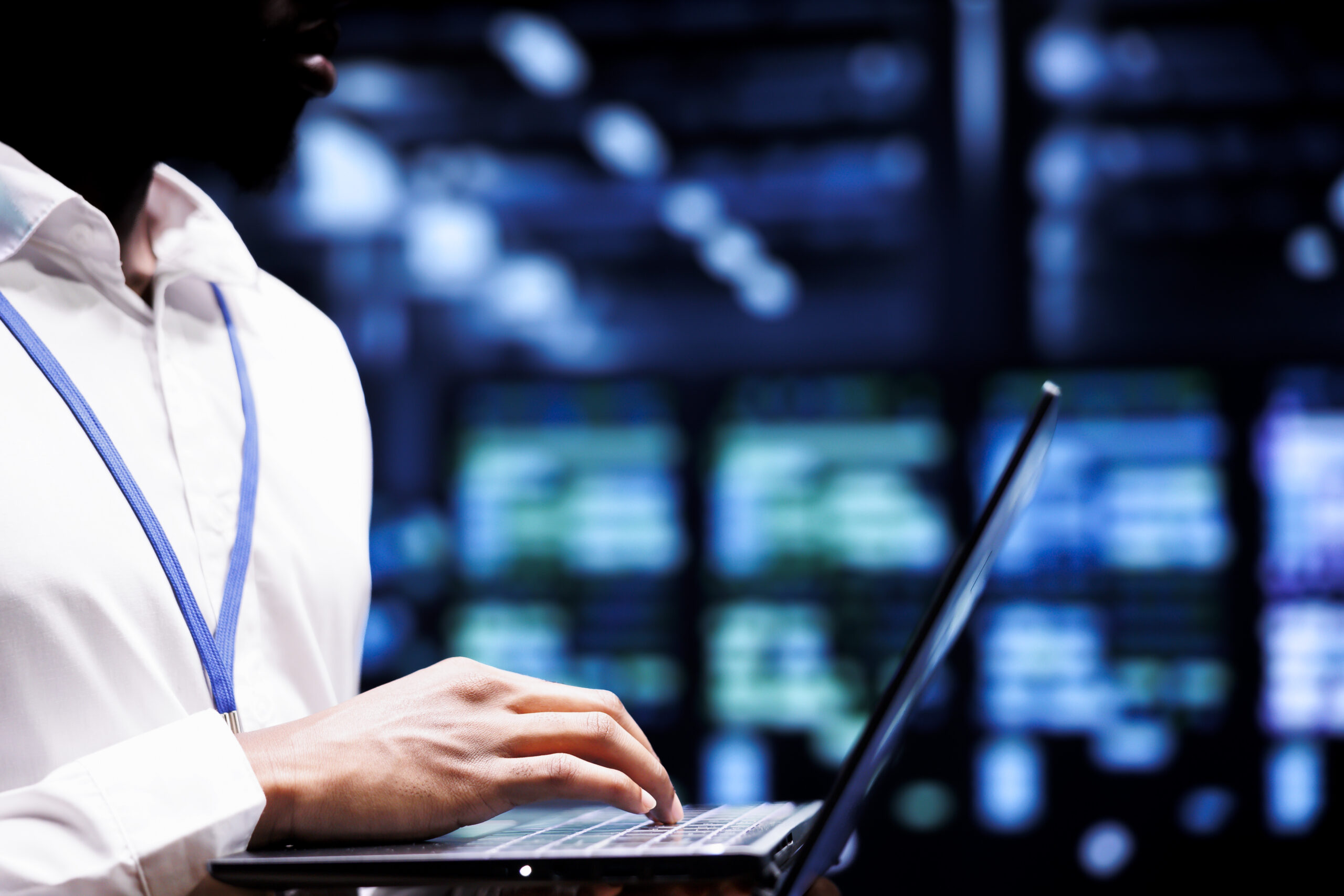 Employee using laptop in an office