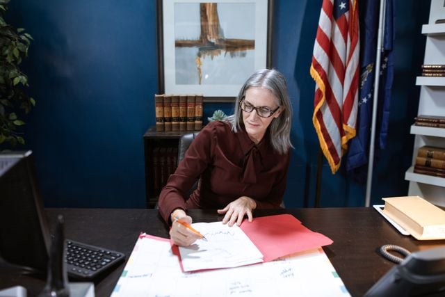 Photo by RDNE Stock project: https://www.pexels.com/photo/woman-in-maroon-long-sleeves-writing-on-paper-6172476/